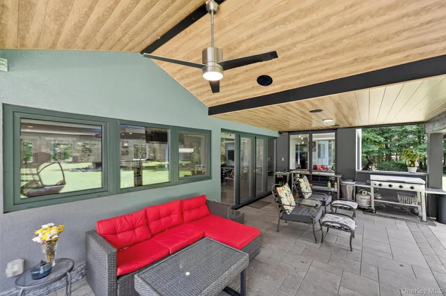 a workspace with furniture and window