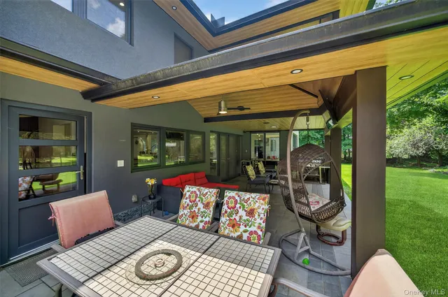 a view of washer and dryer with kitchen in the background