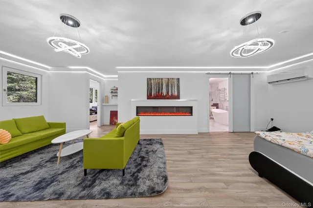 a bathroom with a shower sink and mirror