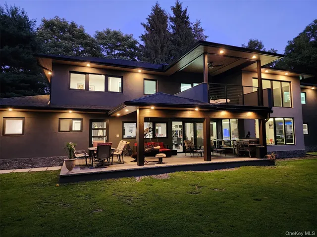 a view of kitchen with refrigerator and window