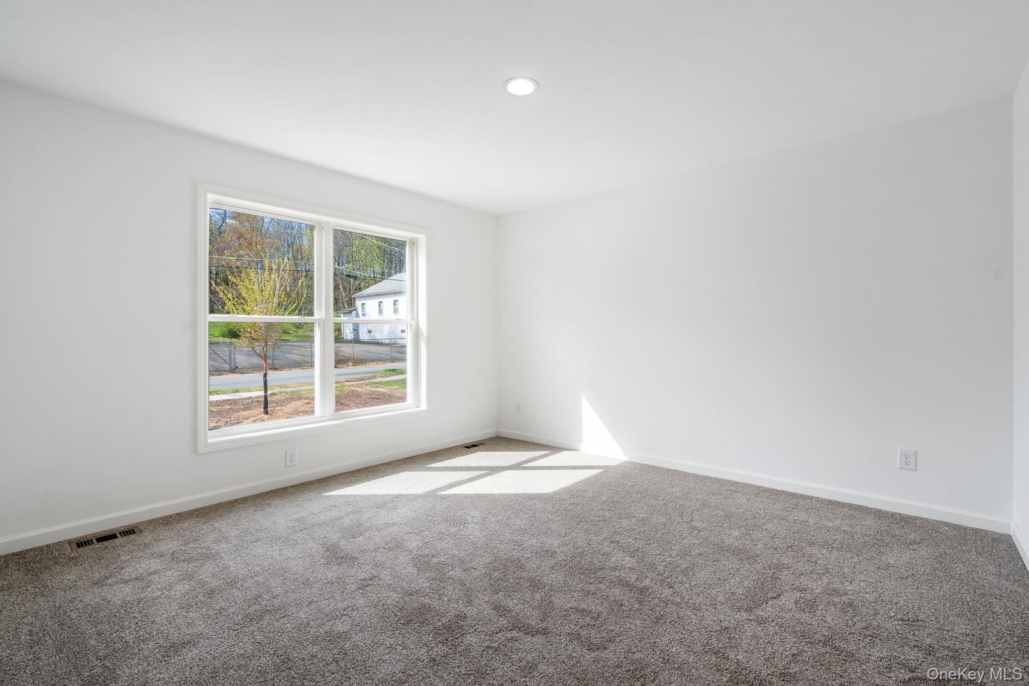 23 Spring Street Monticello, NY 12701 - Photo 26 of 44 an empty room with a window