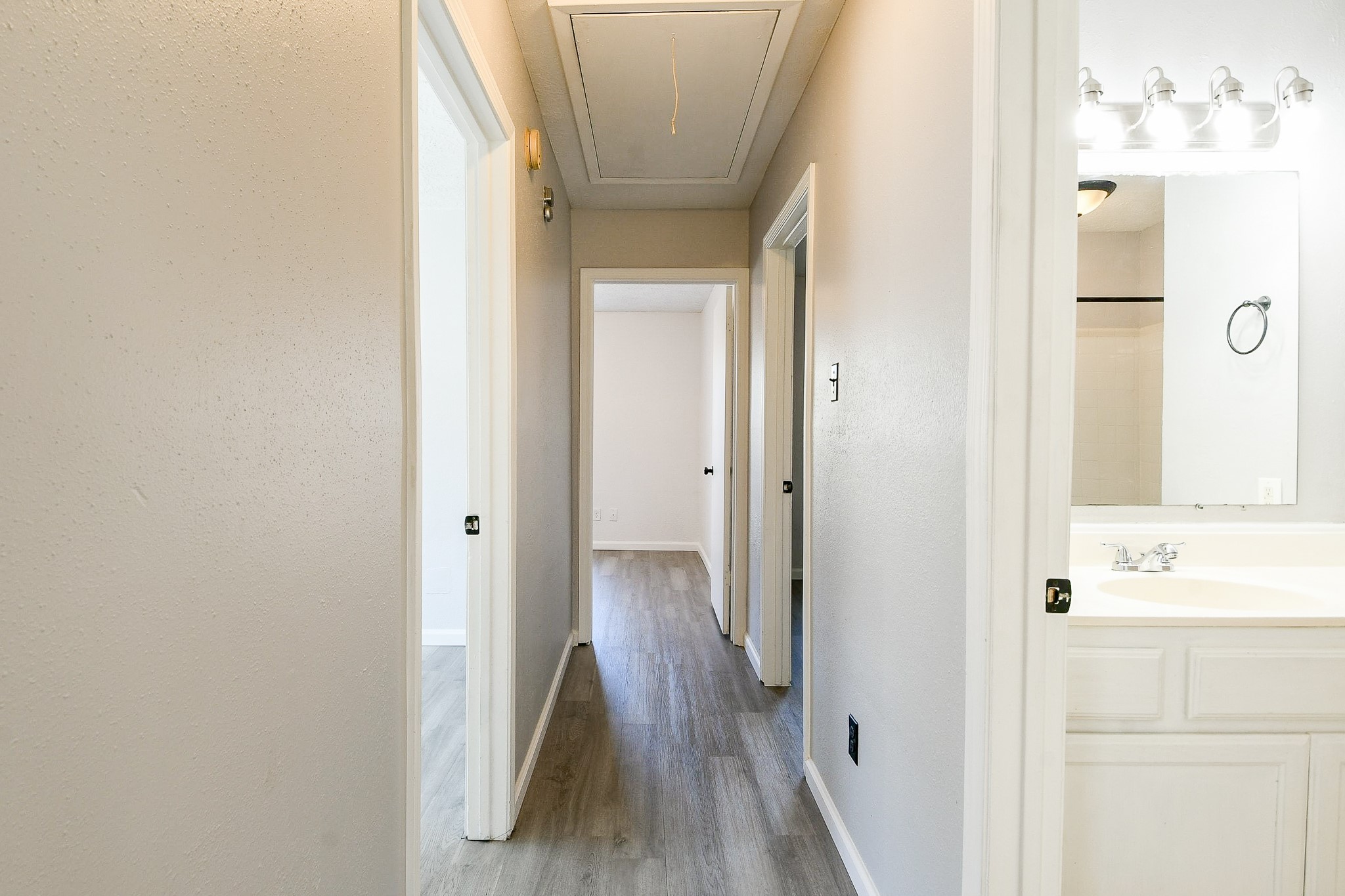 4719 Brownfields Drive Houston, TX 77066 - Photo 16 of 20 a view of a bathroom from a hallway