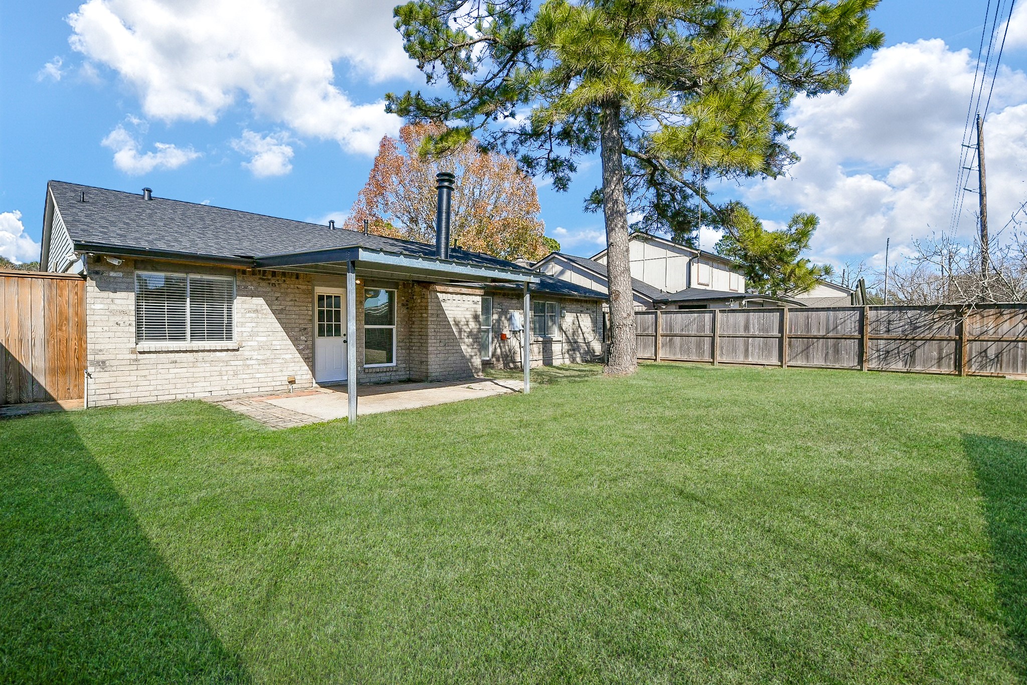 4719 Brownfields Drive Houston, TX 77066 - Photo 19 of 20 a view of a house with a yard
