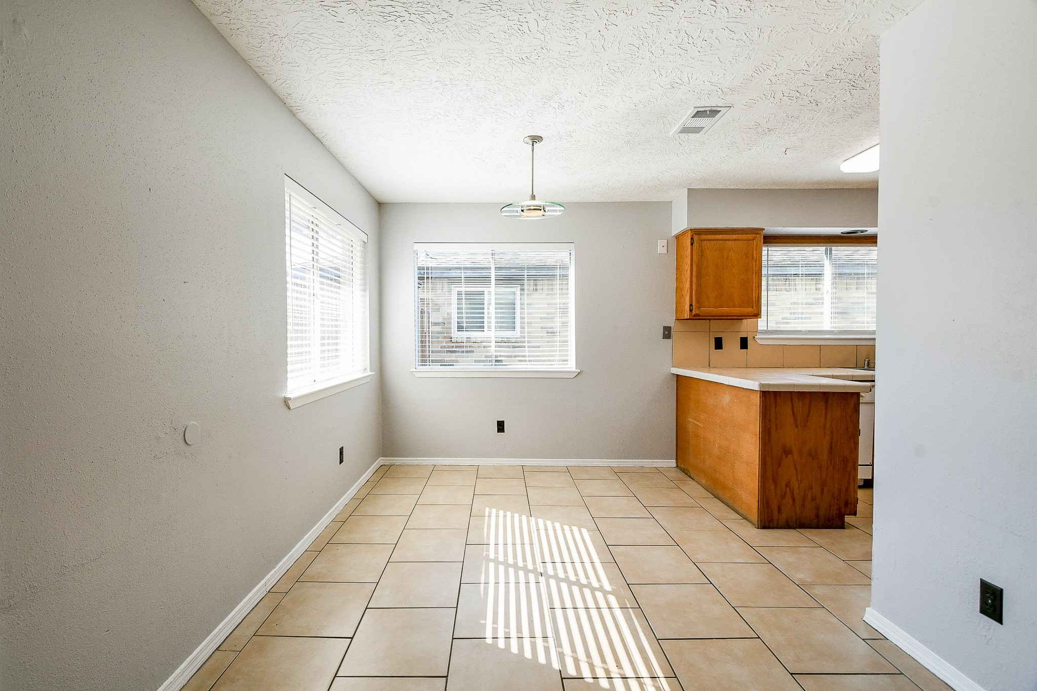 4719 Brownfields Drive Houston, TX 77066 - Photo 10 of 20 a view of kitchen with a sink and a window