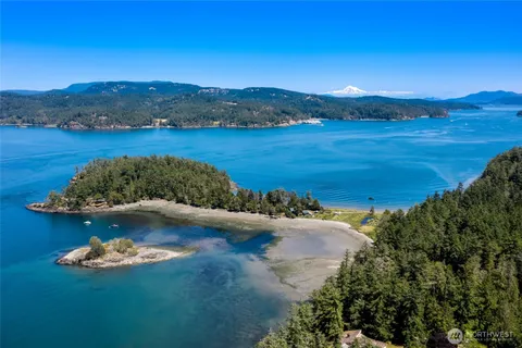 a view of a lake with mountains in the background