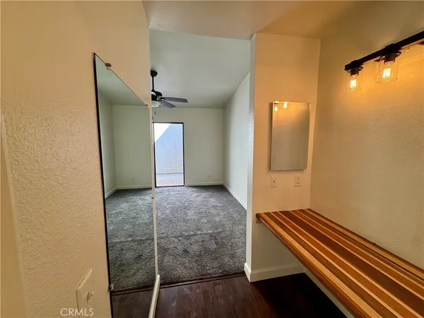 a view of a hallway with entryway