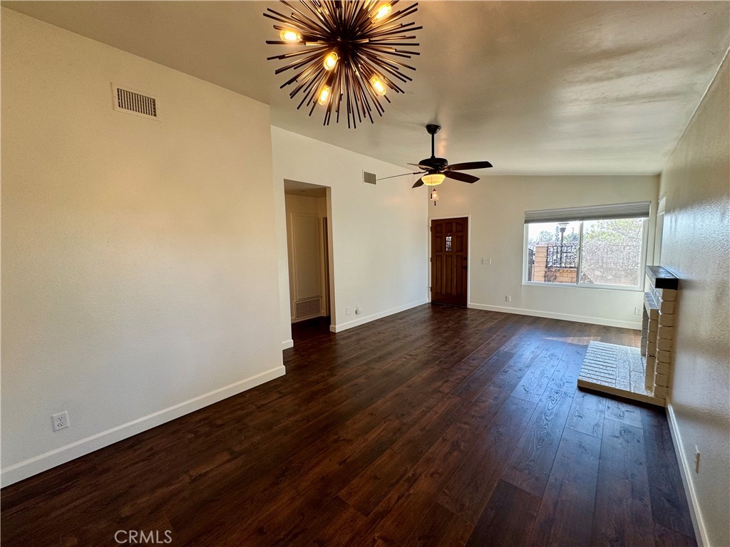 9801 Allesandro Court Rancho Cucamonga, CA 91730 - Photo 4 of 21 wooden floor in an empty room with a window