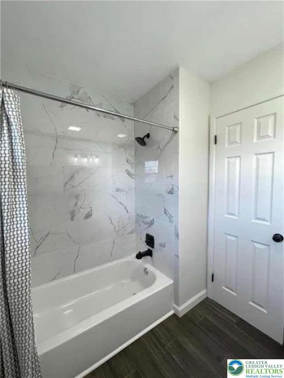 3111 Hecktown Road Bethlehem, PA 18020 - Photo 19 of 24 a bathroom with a bathtub and a shower