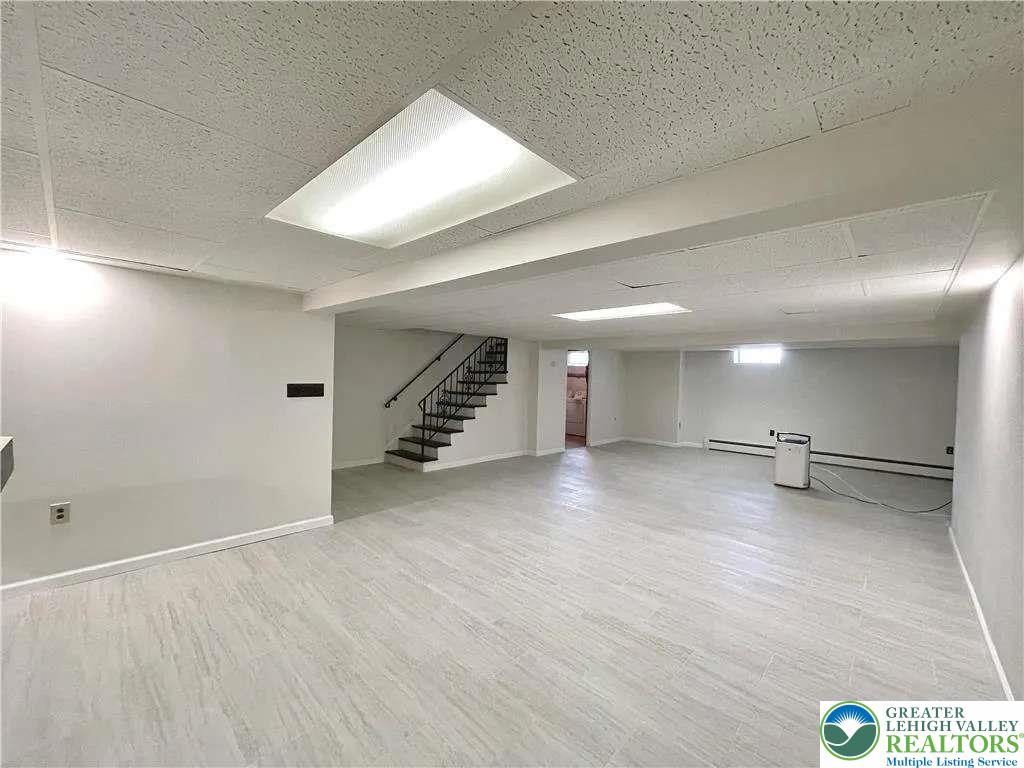 3111 Hecktown Road Bethlehem, PA 18020 - Photo 20 of 24 an empty room with wooden floor and windows