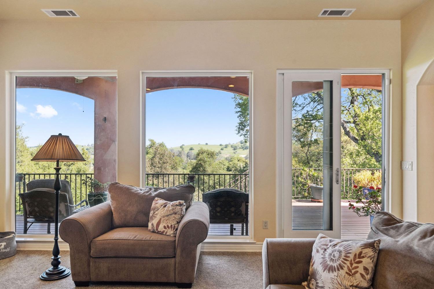 125 Raylan Drive Sutter Creek, CA 95685 - Photo 15 of 79 a living room with furniture and a window