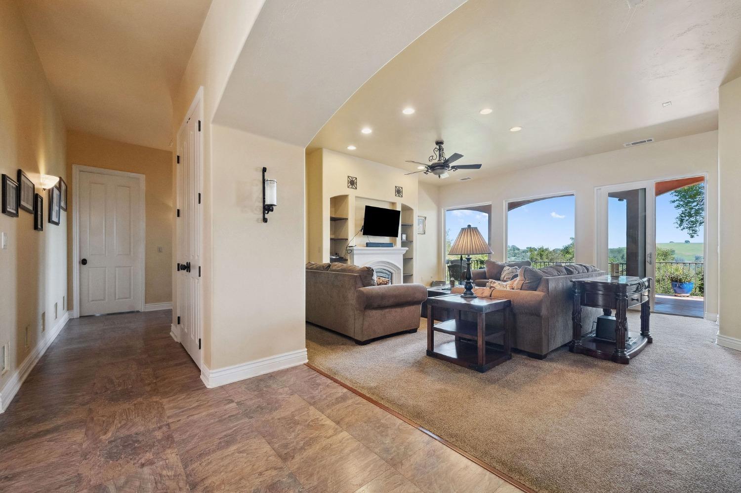 125 Raylan Drive Sutter Creek, CA 95685 - Photo 18 of 79 a living room with furniture and a large window