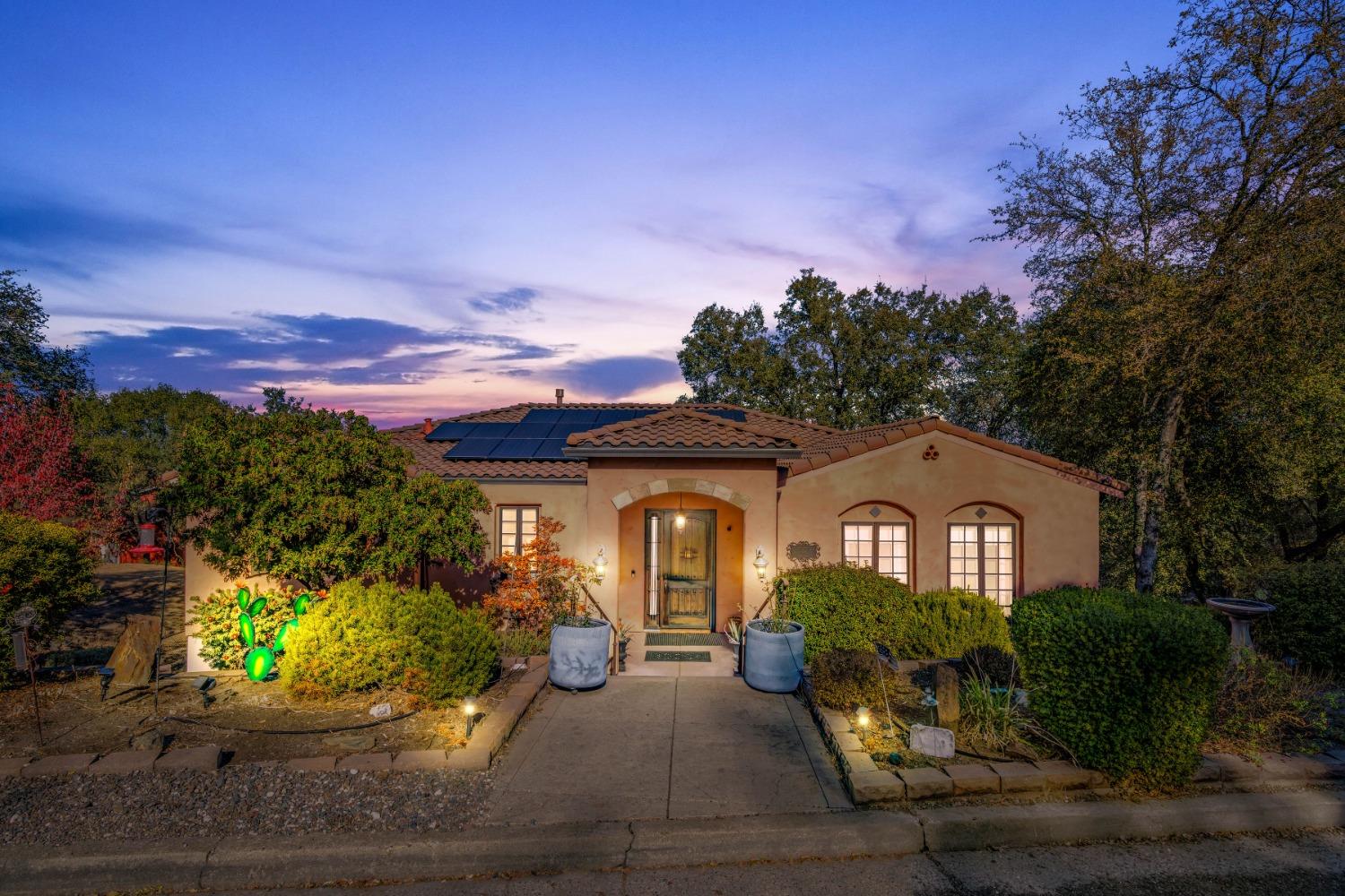 125 Raylan Drive Sutter Creek, CA 95685 - Photo 2 of 79 a front view of a house with a yard