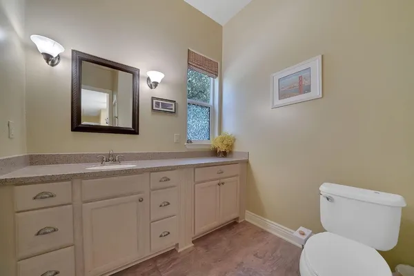 a bathroom with a sink and a toilet