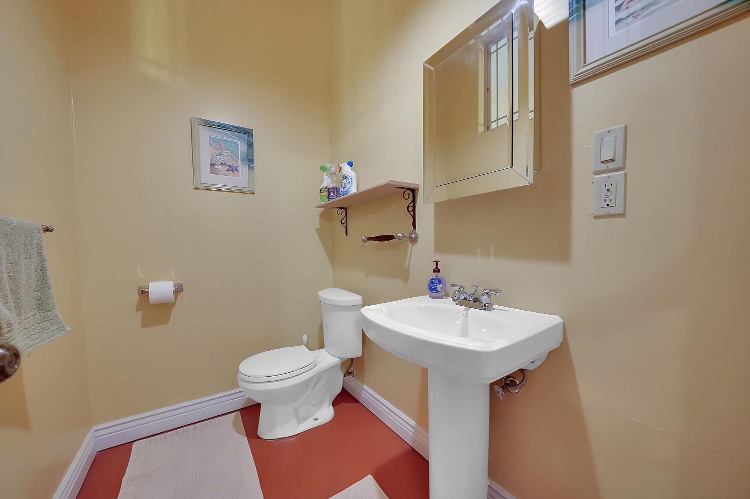 125 Raylan Drive Sutter Creek, CA 95685 - Photo 53 of 79 a bathroom with a sink and a toilet