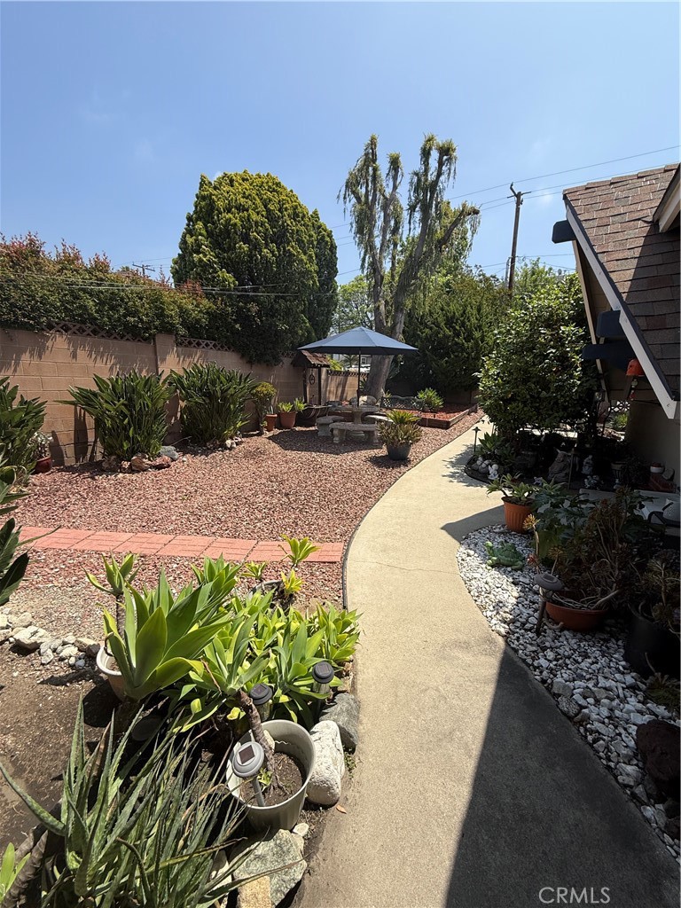 4535 Ramsdell Avenue La Crescenta, CA 91214 - Photo 16 of 28 a view of a garden with a bench in the patio