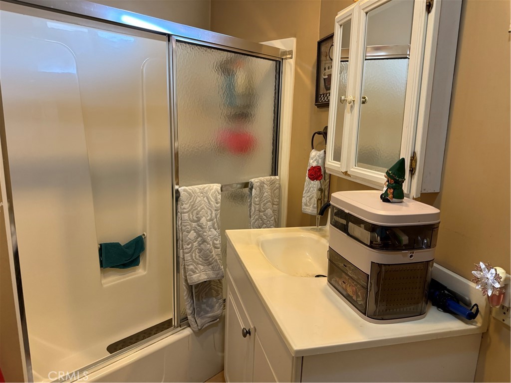 4535 Ramsdell Avenue La Crescenta, CA 91214 - Photo 17 of 28 a bathroom with a sink and a mirror