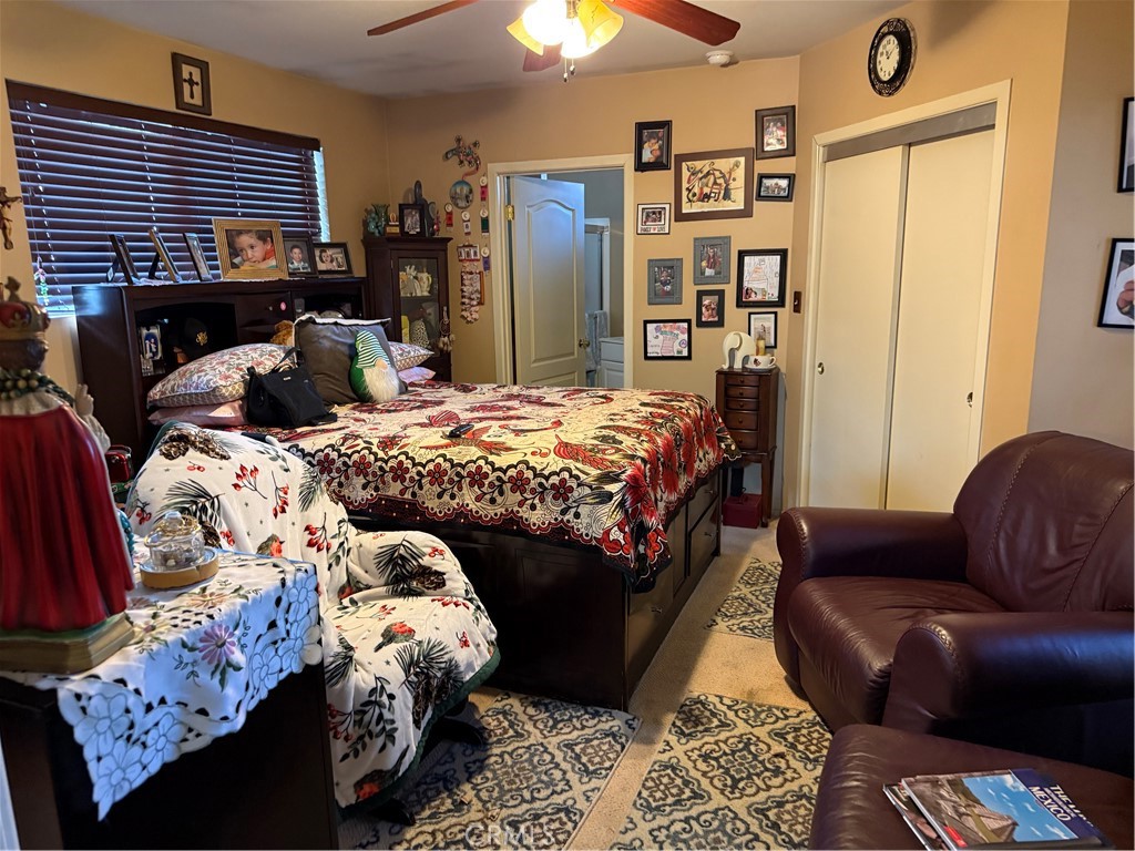 4535 Ramsdell Avenue La Crescenta, CA 91214 - Photo 19 of 28 a bedroom with bed and a couch