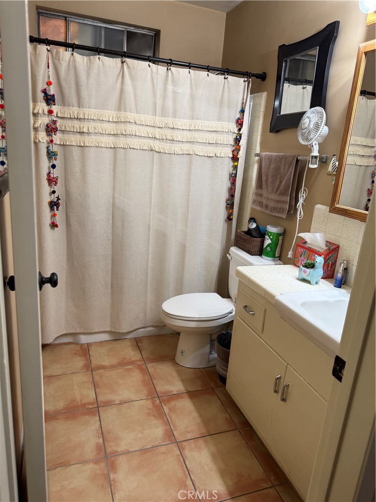 4535 Ramsdell Avenue La Crescenta, CA 91214 - Photo 21 of 28 a bathroom with a sink toilet and shower