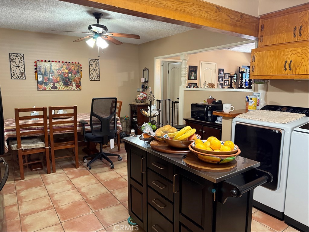 4535 Ramsdell Avenue La Crescenta, CA 91214 - Photo 22 of 28 a view of a dining room with furniture and a kitchen