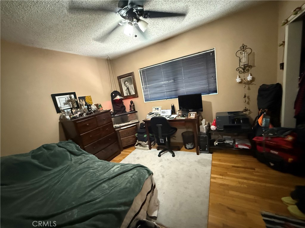 4535 Ramsdell Avenue La Crescenta, CA 91214 - Photo 24 of 28 a living room with furniture and a flat screen tv