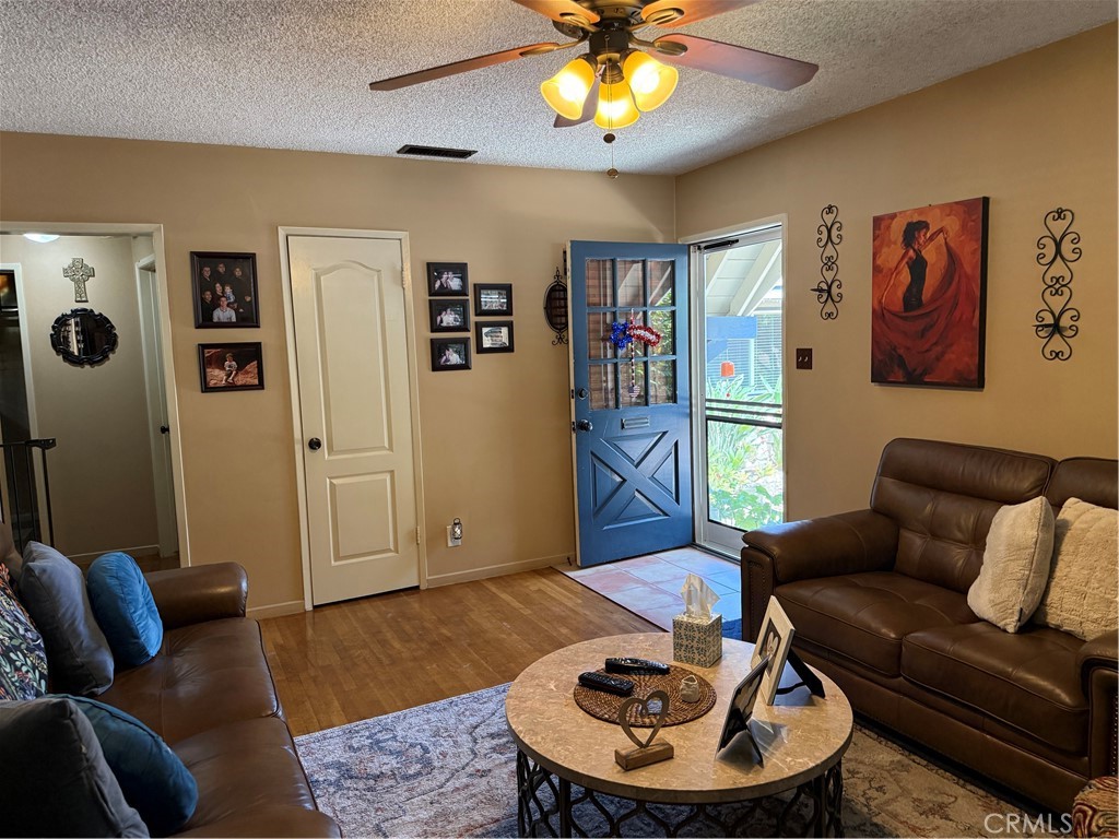 4535 Ramsdell Avenue La Crescenta, CA 91214 - Photo 26 of 28 a living room with furniture and a rug