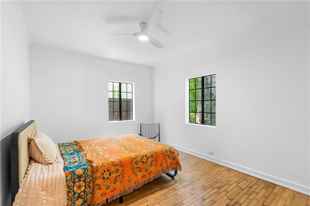 1981 North Decatur Road Atlanta, GA 30307 - Photo 8 of 20 a bedroom with a bed and a window