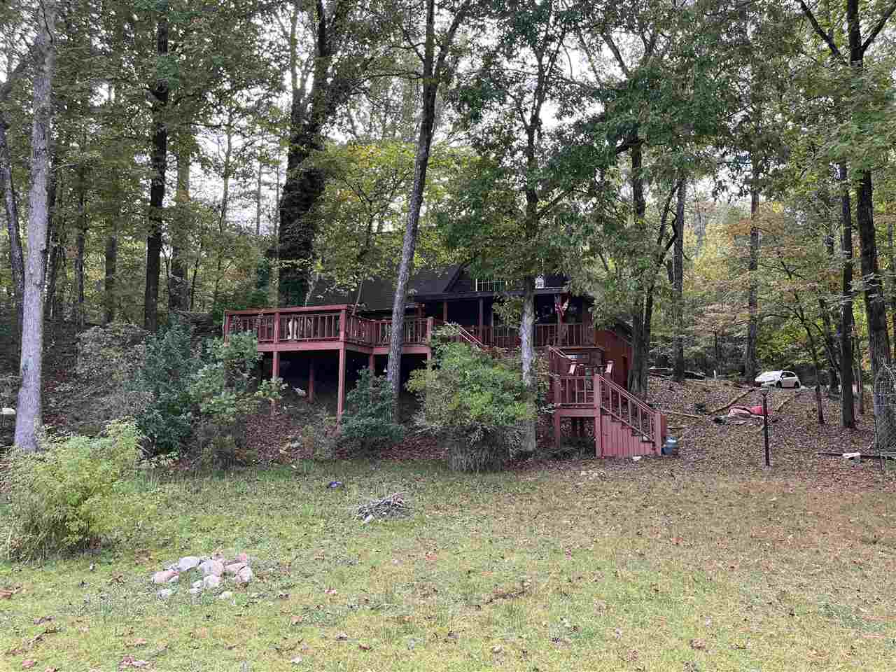 110 Edgewater Drive Middleton, TN 38052 - Photo 2 of 16 a view of a backyard with sitting area and furniture