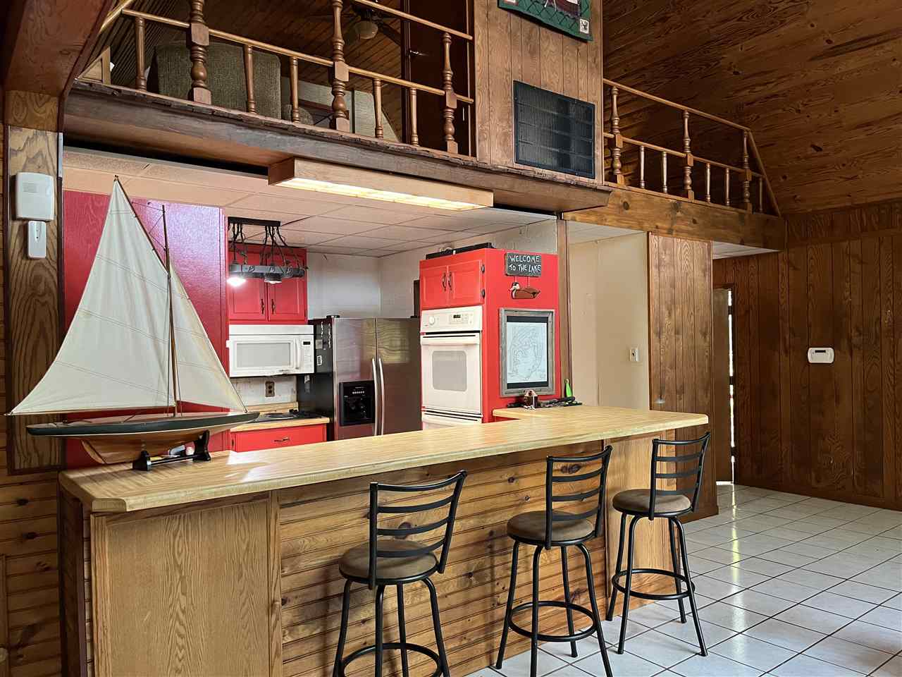 110 Edgewater Drive Middleton, TN 38052 - Photo 8 of 16 a view of a cafe with sitting area