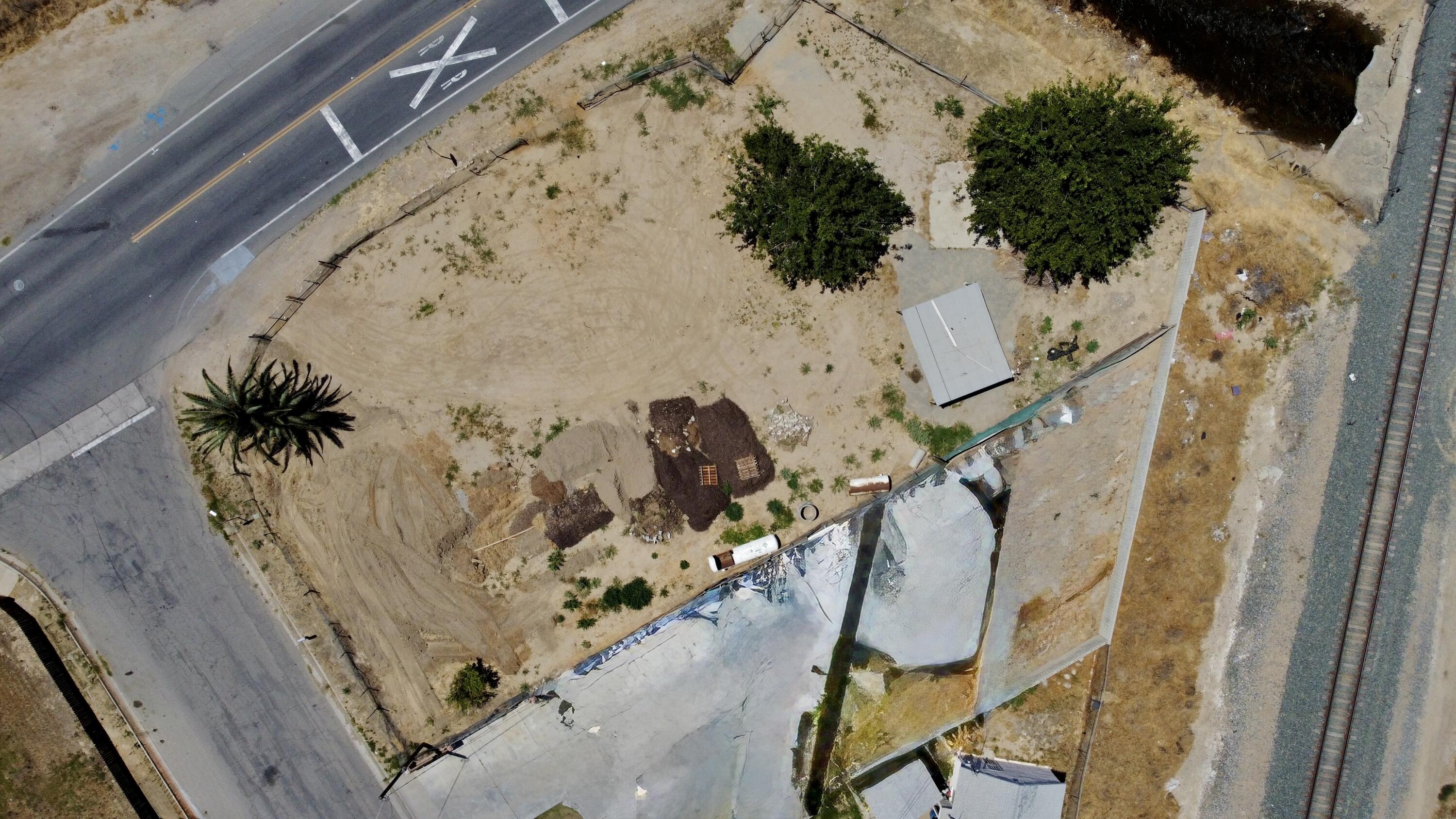 326 Wilson Road Bakersfield, CA 93307 - Photo 18 of 26 an aerial view of a house with a yard