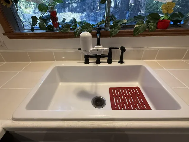 a bathroom with a bathtub and sink