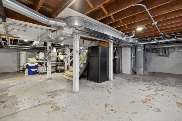 a view of empty room with wooden ceiling