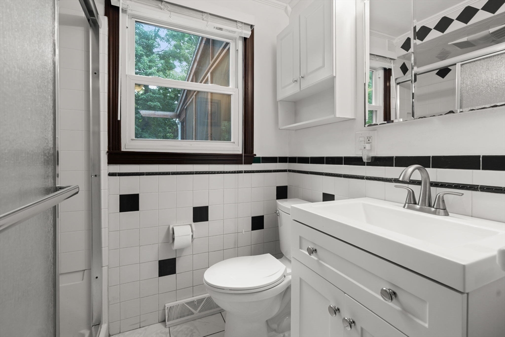 9 Laurel Lane Bellingham, MA 02019 - Photo 21 of 30 a bathroom with a sink and a toilet