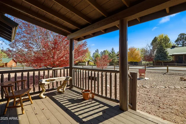 a view of balcony with wooden floor