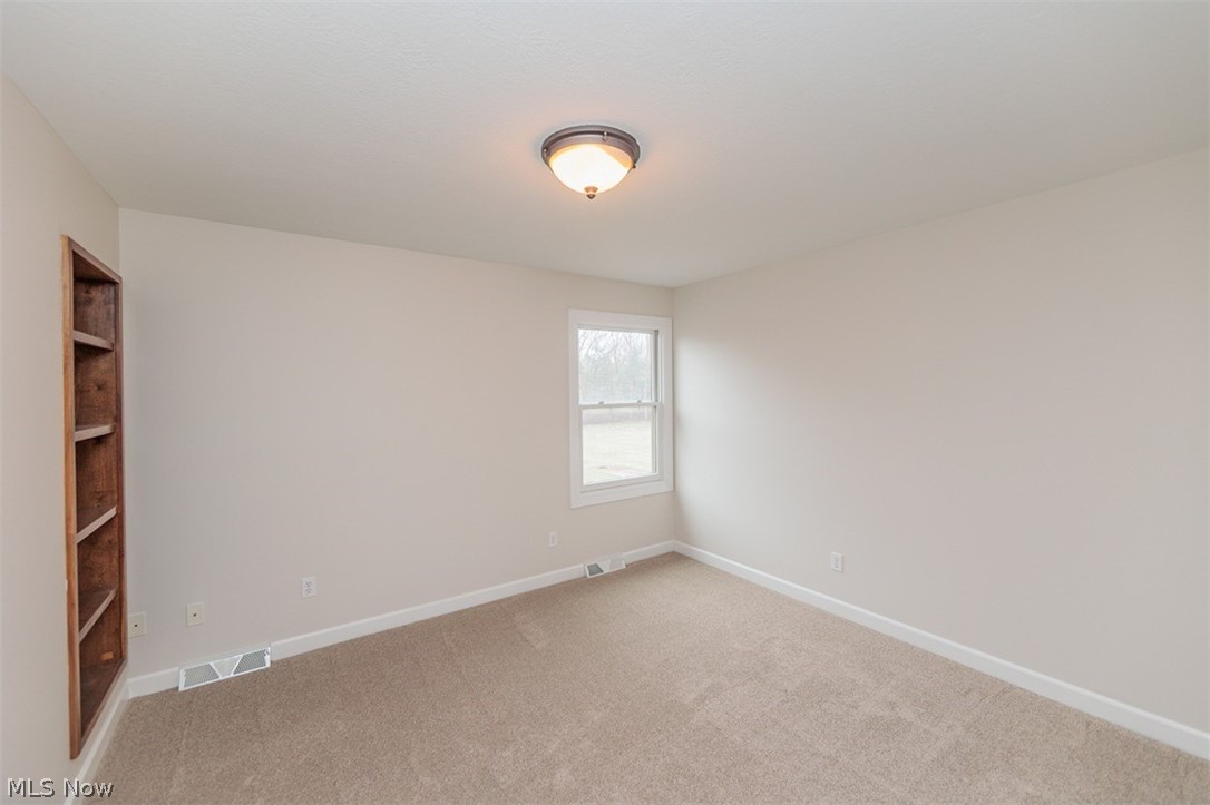 6947 Som Center Road Solon, OH 44139 - Photo 47 of 50 View of carpeted empty room