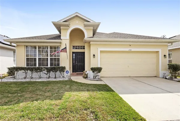 a front view of house with outdoor seating