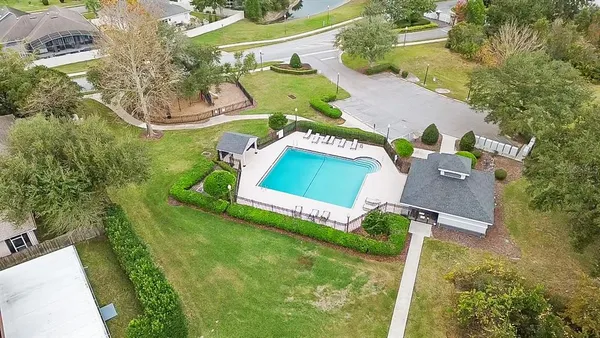 an aerial view of a house with outdoor space