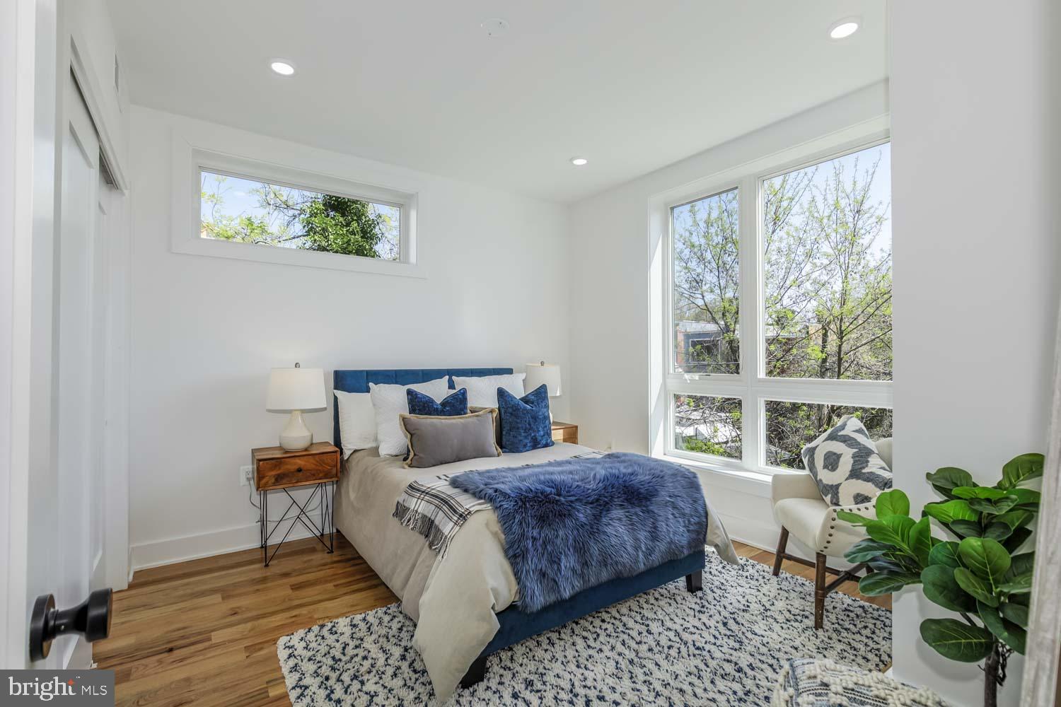 428 Manor Place Northwest, Unit 2 Washington, DC 20010 - Photo 16 of 27 a bedroom with bed and a window