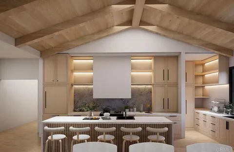 a living room with furniture and a mirror