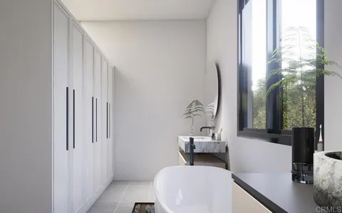 storage and utility room with chairs