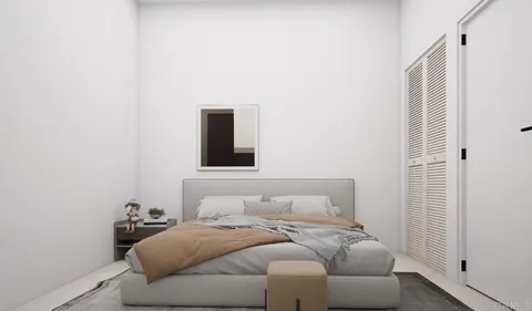 a kitchen with white cabinets and white appliances