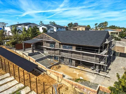 a view of a house with a swimming pool
