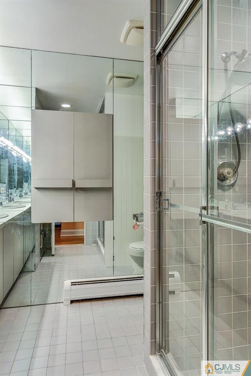16 Mockingbird Road Edison, NJ 08820 - Photo 22 of 25 a bathroom with a shower and a sink