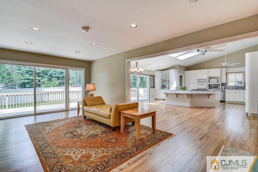 16 Mockingbird Road Edison, NJ 08820 - Photo 5 of 25 a living room with furniture and a wooden floor