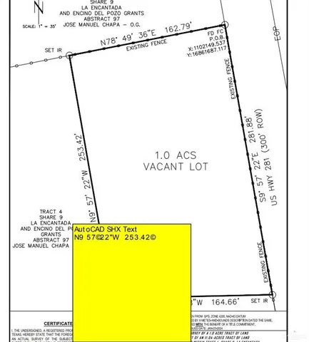 a view of a dry yard with trees