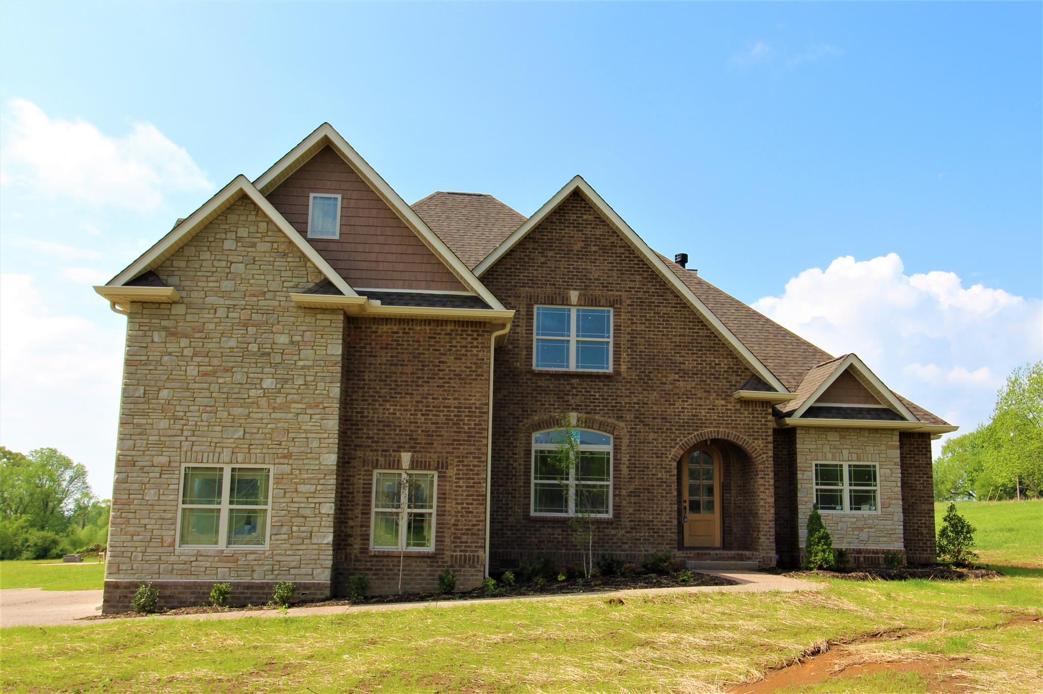 288 Bates Road Lebanon, TN 37087 - Photo 1 of 26 a front view of a house with a yard