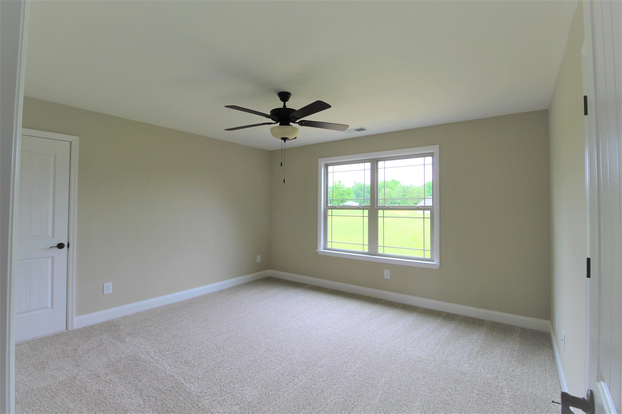 288 Bates Road Lebanon, TN 37087 - Photo 22 of 26 a view of a livingroom with a window and a kitchen