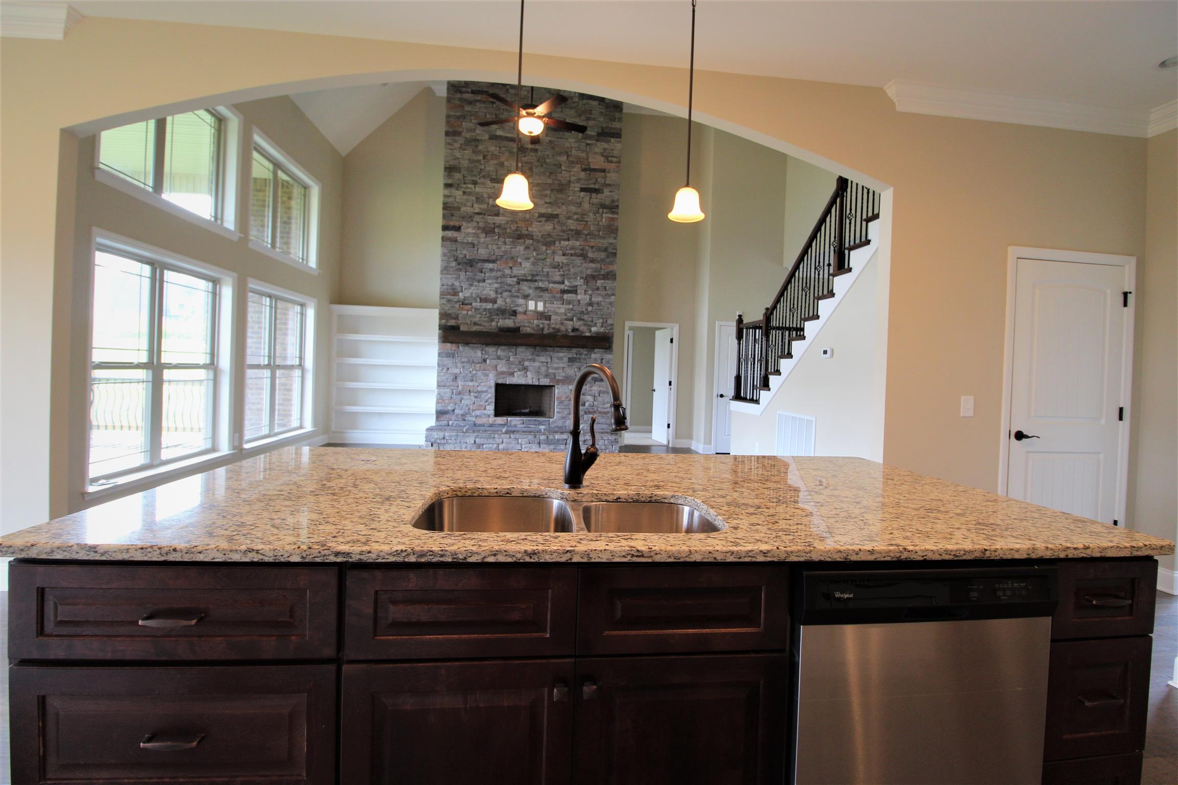 288 Bates Road Lebanon, TN 37087 - Photo 9 of 26 a kitchen with granite countertop a sink stainless steel appliances and a chandelier