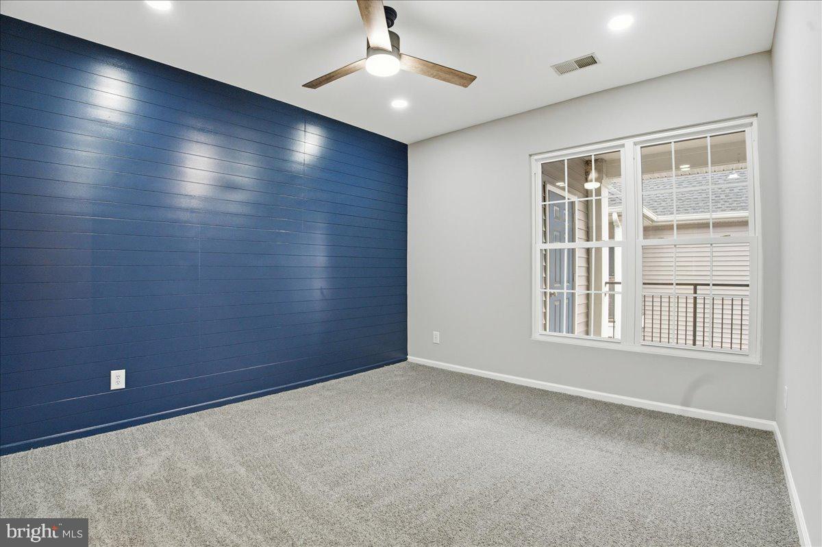 20419 Riverbend Square, Unit 301 Sterling, VA 20165 - Photo 15 of 25 a view of an empty room with a window