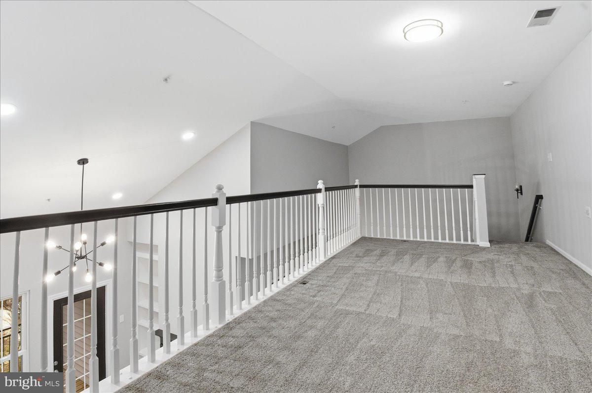 20419 Riverbend Square, Unit 301 Sterling, VA 20165 - Photo 16 of 25 a view of a hallway