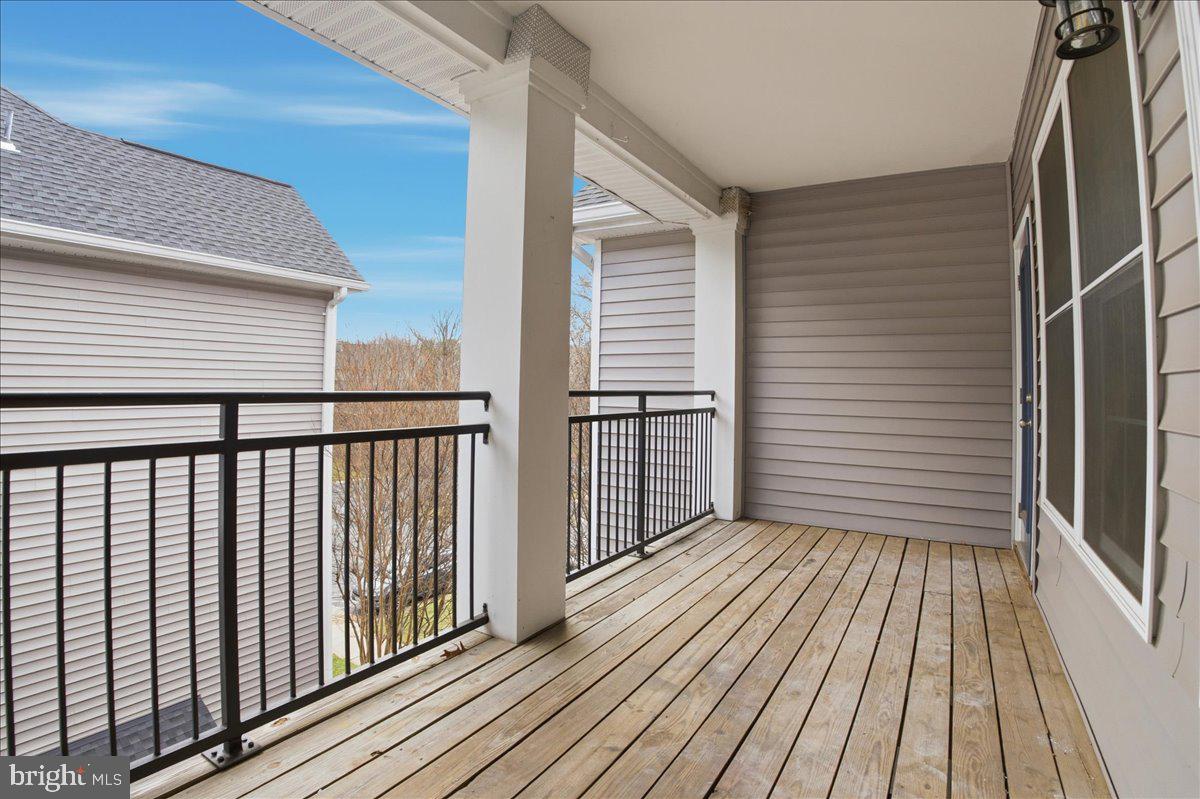20419 Riverbend Square, Unit 301 Sterling, VA 20165 - Photo 21 of 25 a view of wooden balcony